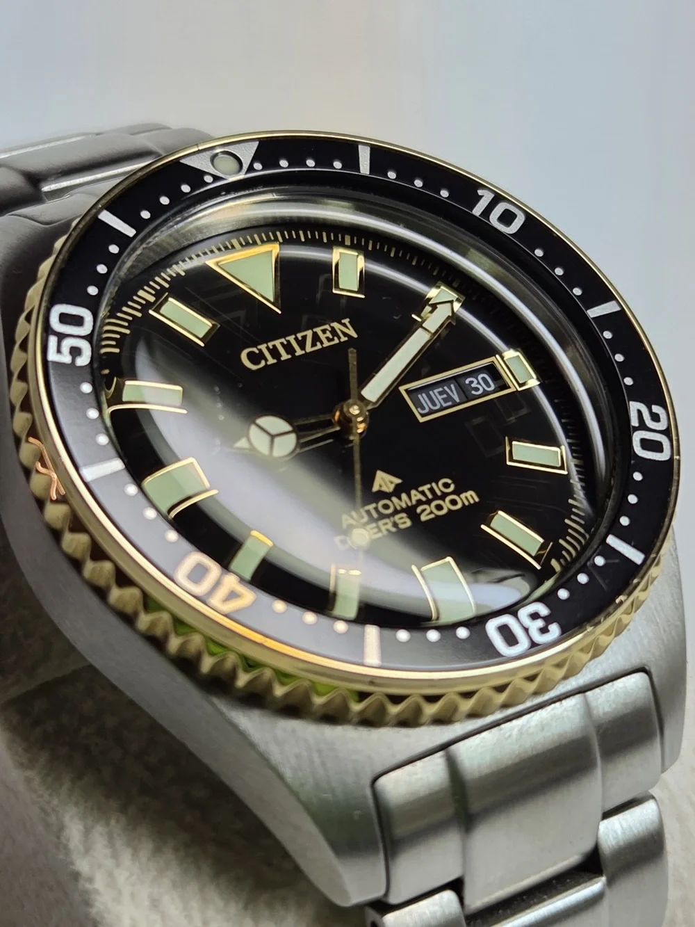 Citizen Black Dial Stainless Steel Diver Watch with Gold Accents